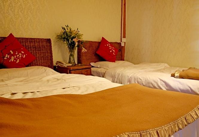 Aparthotel Li Dao Yuan à Lijiang  Chambre photo