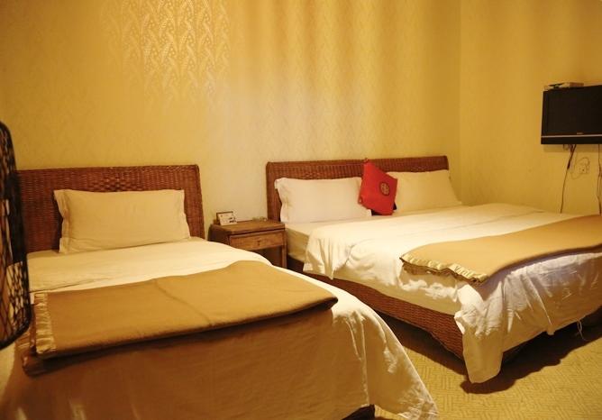Aparthotel Li Dao Yuan à Lijiang  Chambre photo