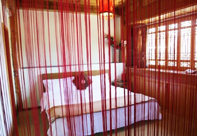 Aparthotel Li Dao Yuan à Lijiang  Chambre photo