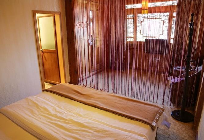Aparthotel Li Dao Yuan à Lijiang  Chambre photo