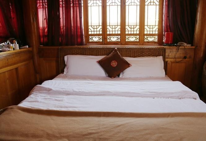 Aparthotel Li Dao Yuan à Lijiang  Chambre photo