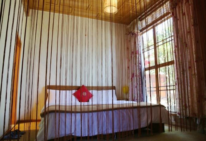 Aparthotel Li Dao Yuan à Lijiang  Chambre photo